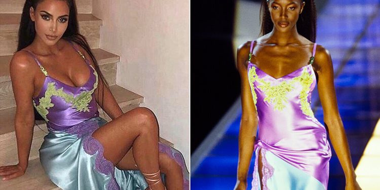 Kim Kardashian Naomi Campbell

https://www.instagram.com/p/BvbjkYRHuUx/

Credit: Kim Kardashian/Instagram

Model Naomi Campbell wearing a high slit purple and blue satin gown with lace trim walks Gianni Versace Fall 1996 RTW (pret a porter) Runway collection.  (Photo by Guy Marineau/Conde Nast via Getty Images)*** Local Caption ***Naomi Campbell;