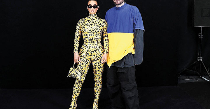 Paris, FRANCE  - *EXCLUSIVE*  - Kim Kardashian dons a yellow caution tape ensemble at the Balenciaga Fall/Winter 2022/2023 show during Paris Fashion Week at Le Bourget in Paris, France.

Pictured: Kim Kardashian

BACKGRID USA 6 MARCH 2022 

BYLINE MUST READ: Best Image / BACKGRID

USA: +1 310 798 9111 / usasales@backgrid.com

UK: +44 208 344 2007 / uksales@backgrid.com

*UK Clients - Pictures Containing Children
Please Pixelate Face Prior To Publication*